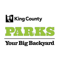 a logo that reads king county parks your big backyard